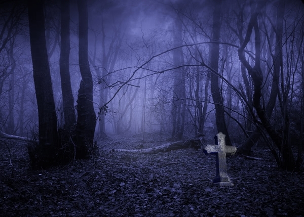 spooky cemetery at night